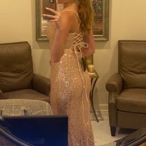 Gold sequin dress.